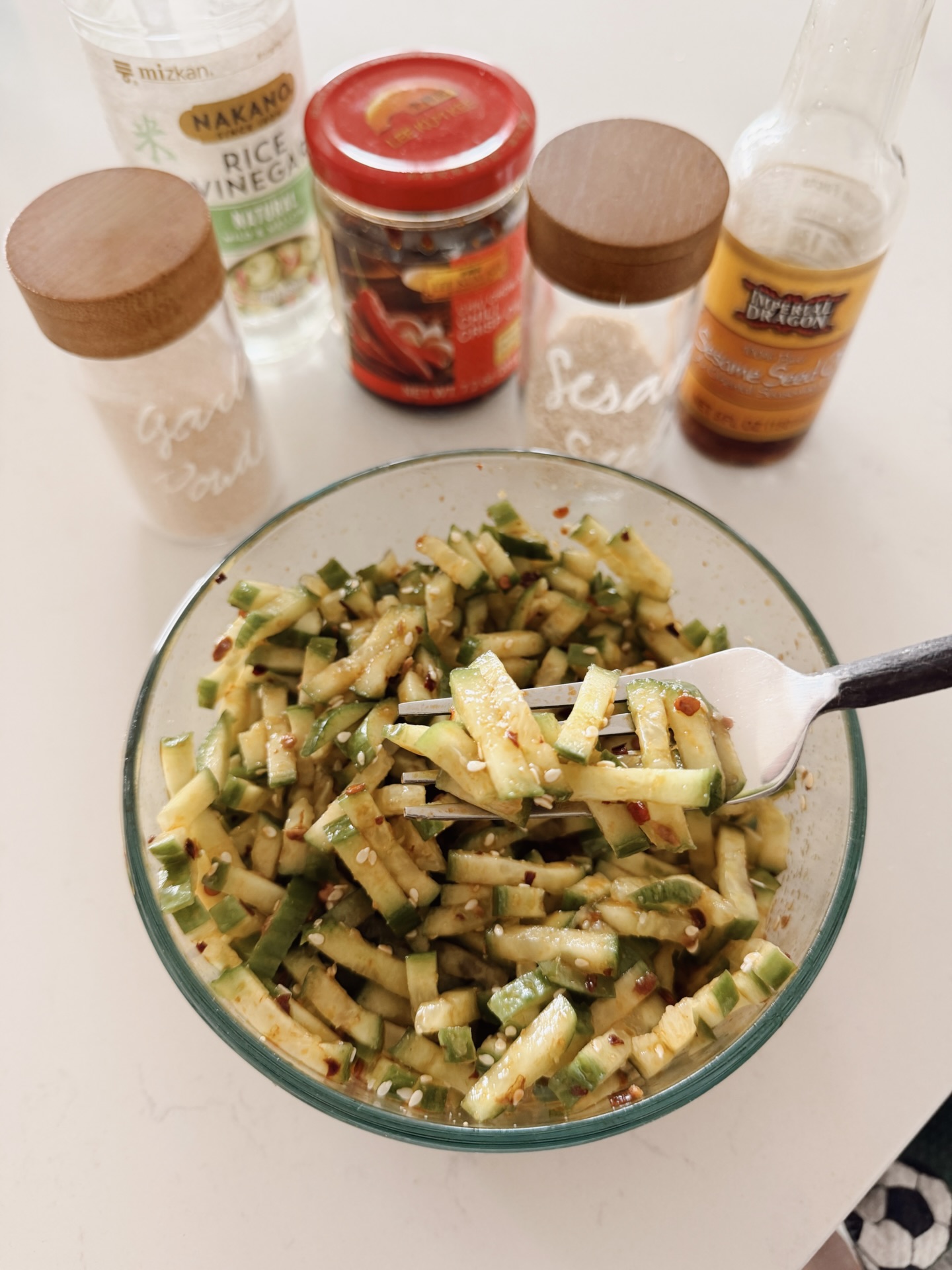 I worked out for the first time in years. I honestly don’t remember the last time. 😬 17 minutes on the stepper that I bought 3 months ago and finally took out of the box last week. My legs are dead but if you want a great playlist that keeps your mind off of the fact you’re working out, message me and I’ll send you a killer millennial playlist that Niña told me about! I almost lost my balance on the stepper because my arms were up in the air dancing but my legs were just stepping. 🤣 Here’s to getting my booty back because there’s not much back there! Oh and here’s a cucumber salad I made…  cucumbers, chili crisp oil, rice vinegar, garlic powder, sesame seed oil, sesame seeds. 🤤